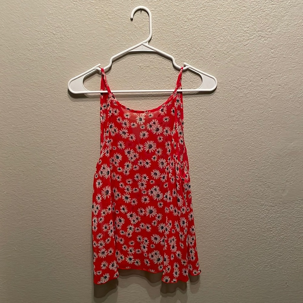Partially see through flower tank top